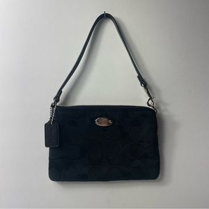 Small blk Coach emblem purse